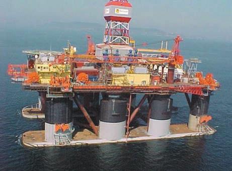 DEVELOPMENT PHASE OF HYDROCARBON FIELDS required during horizontal transportation and to up-end the tower, is now obtained by installing a parallelepiped at the base of the frame.
