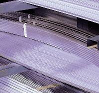 Decoustics offers concealed, stretch-formed aluminum edging for curved shapes and extruded