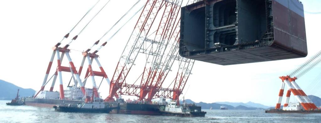 The crane is rated for 8,000 t at 82 m from boom heel.