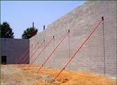 Protection of Masonry During Construction Cover top of unfinished masonry (.8.B): Efflorescence is often caused by water in cells evaporating through the faces of the wall. Avoid premature loading (.