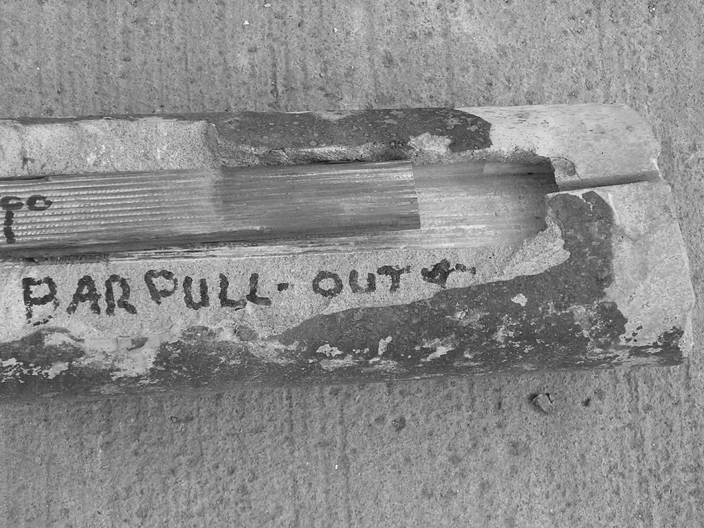 Figure 11 Test B gunbarrel exhibited complete pull-out of the bar from the cement grout at the base (2m bond length) 7.