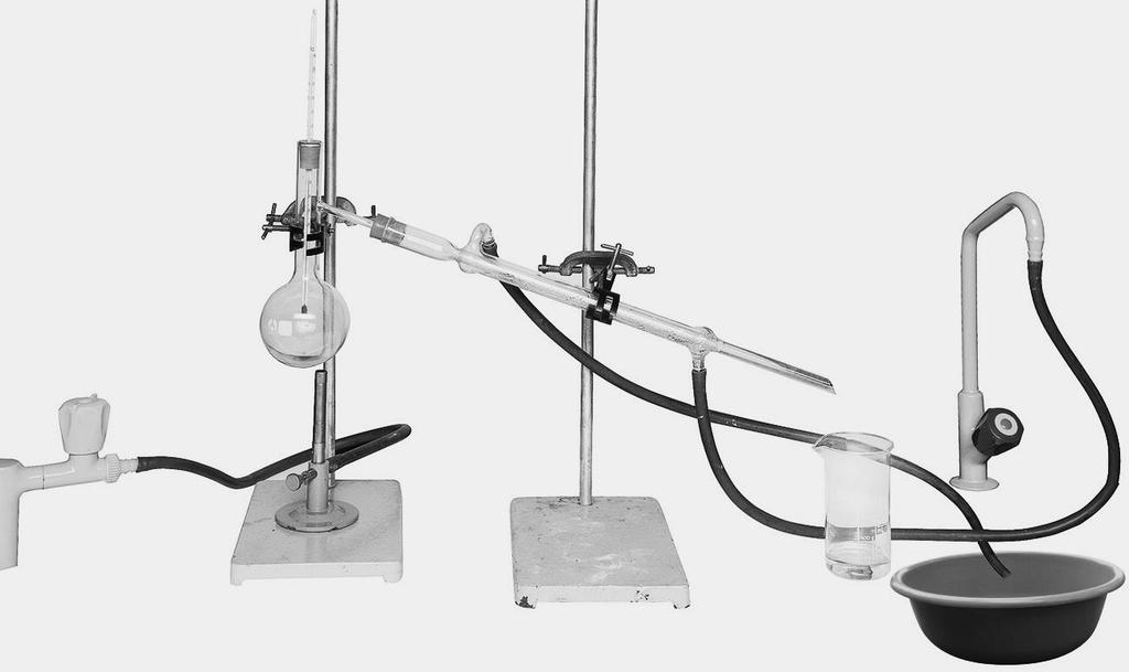 1.2 The apparatus below was set up to separate a mixture of alcohol and water. Note: Marks are allocated for following diagram rules for 1.2.1 and 1.2.2. [18] 1.2.1 Label the following on the diagram above: (10) Liebig Condenser, retort stand, round bottomed flask, Bunsen burner, thermometer, inlet valve, distillate.