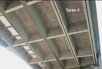 The 12-span continuous bridge structure consists of composite concrete deck-steel girder spans and reinforced concrete middle spans that comprise an intersection for traffic coming from three