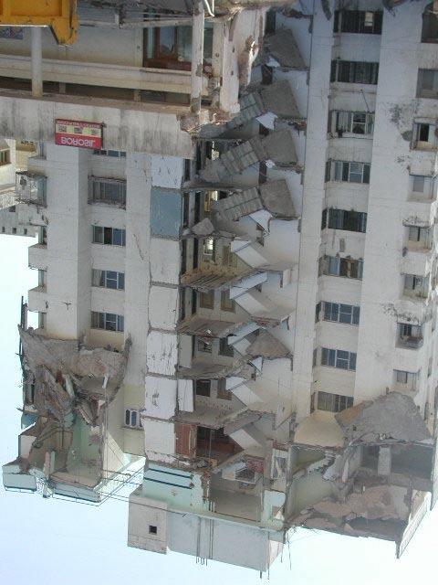 Figure 6. Half of the building pulled away from the elevator core that formed the shear core in the building (Photograph by Goel). Figure 7.