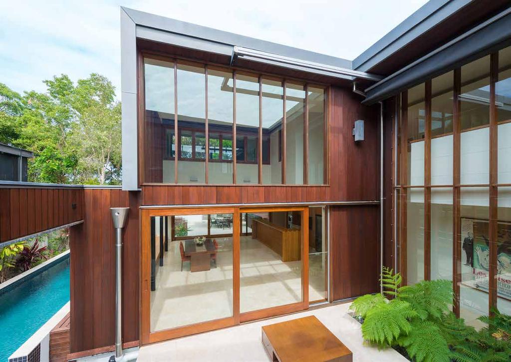 The heat transfer from the sun through the windows and doors original standard clear glass glazing meant the home became too warm during summer.