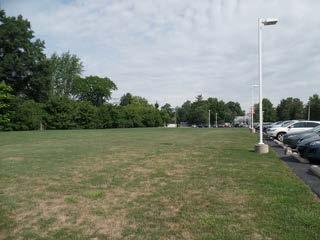 Facility Assessment P. Site Condition Description: Rating: Recommendations: The 5.2 acre flat site is located in a suburban residential setting with moderate tree, shrub, and floral type landscaping.