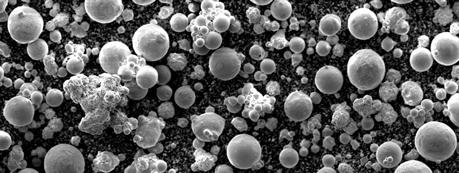particles, and the simultaneous contraction Fe of the components (metal powder particles or ceramic powder), together with the growth of the crystal grains and strong binding