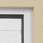 SUSTAINABLE DESIGN Painted angle posts and cover strip perfectly go together with the door leaf.