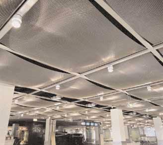 The project provided DIG Deutsche Innenbau GmbH with another opportunity to show off its much modified and improved lustre-mesh system.
