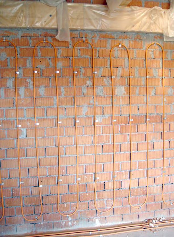 Tube system consisting of 14 mm plastic-coated copper pipes on perforated bricks (brand Cuprotherm) For the natural science connection between