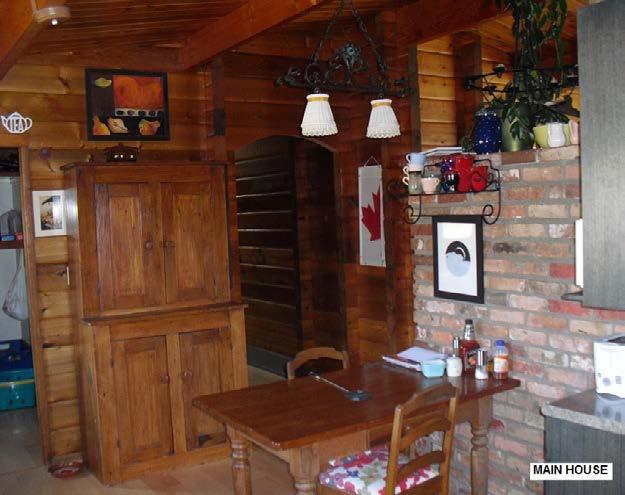 Interior: The main floor is occupied by the owner and includes a large living room