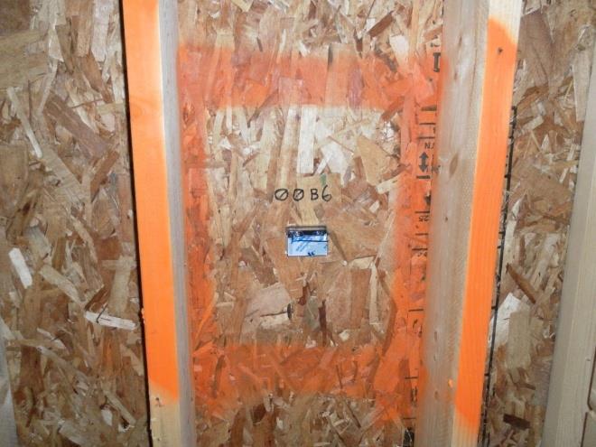 Figure 3. Sensor Installed in OSB Sheathing That Will be Foamed Over in This Test House Figure 4. Sensor Installed in OSB Sheathing That Will Not be Foamed Over in This Cavity Figure 5.