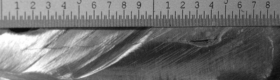 These types of defects were found on all the samples cut from the bellows-to-pipe attachment weld.