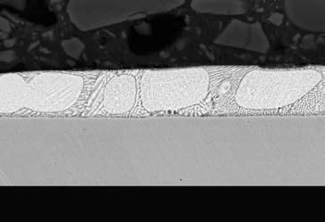 Steel 10 µm Stroncoat layer cross section Standard zinc (Zn) Eutectic MgZn 2 -phase with Zn and Al The cross-section polish of the