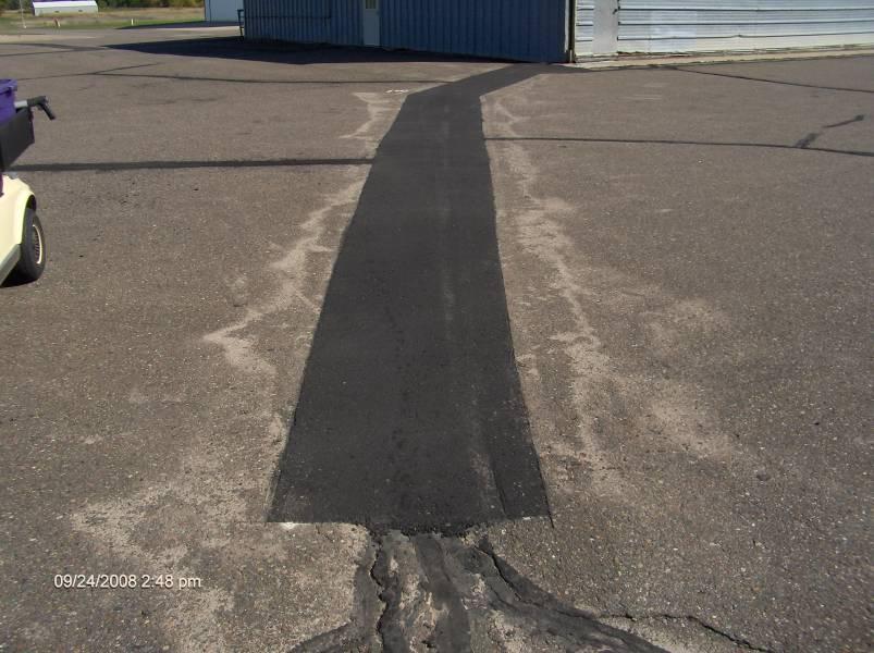 Example of Patching Patched areas are defined when a portion of the original pavement is replaced with a material intended as a semi-permanent repair.