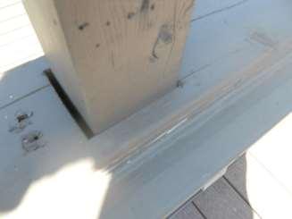 moisture intrusion into barricade No evidence of lag bolt connection of deck to