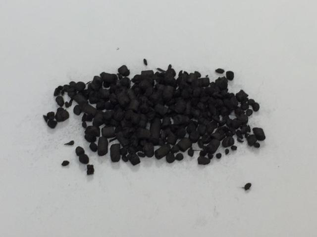 Figure 2: Pellets Made Using Ring Die and Extrusion Processes Problems encountered with the initial pellets made using the ring die process included lack of compaction and fibre shortening from a