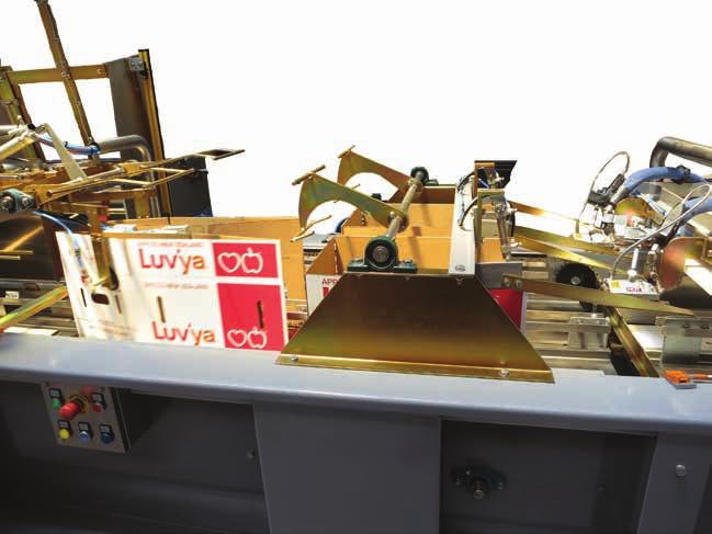 A two stage in-line glue system erector for laminating (Glue fold over of double wall) and forming double side wall cartons.