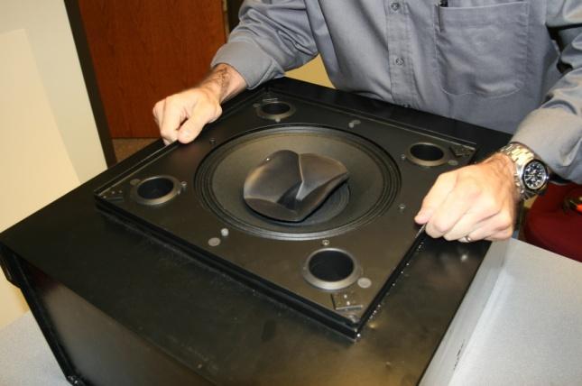5. Set the CLOUD12 into the square hole in the C12BB3. Handle the speaker assembly by its metal frame or baffle plate.