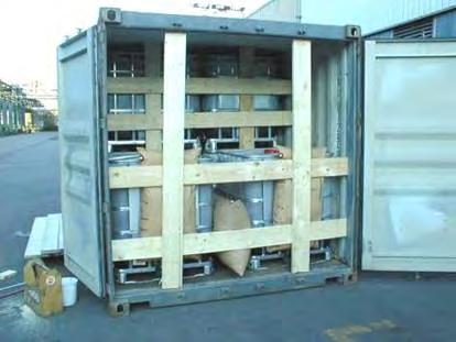 Combination IBCs in an ISO freight container, doublestacked and secured 20 -Container: 18 combination IBCs, blocked by horizontally inserted timber planks, and void spaces filled with air bags or