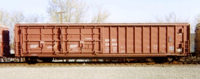 New Component Boxcar Metal shipping containers mounted/tied-down inside boxcars.