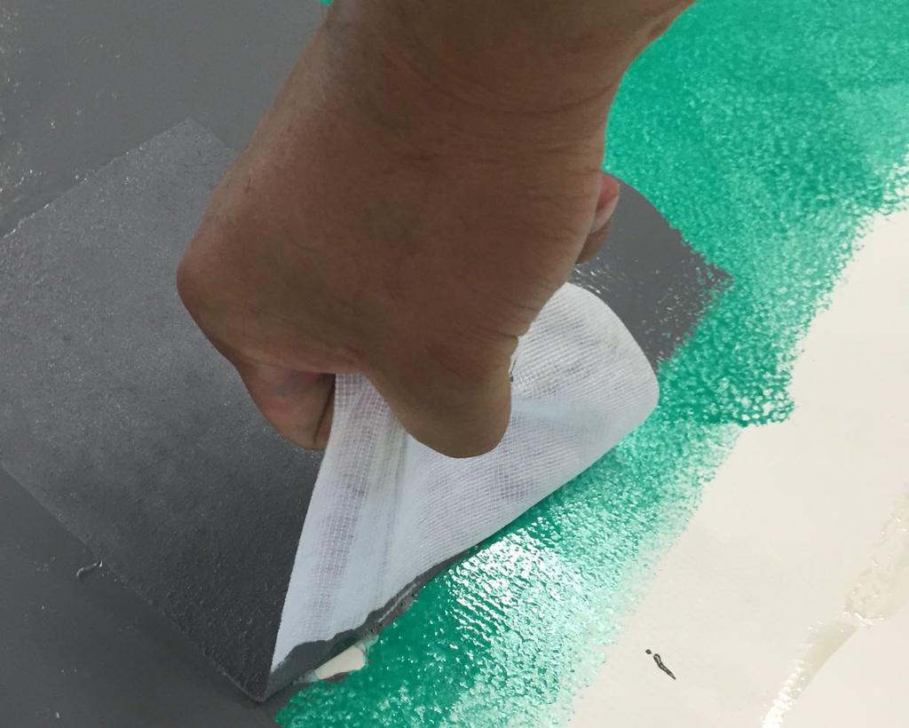 Apply additional coating to embed fabric, allowing a minimum