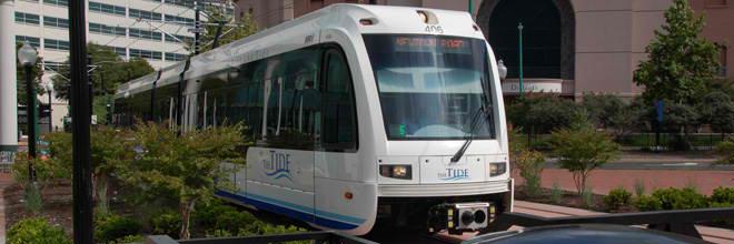 I. LIGHT RAIL The Tide is an 11-station light rail system in Norfolk that extends 7.