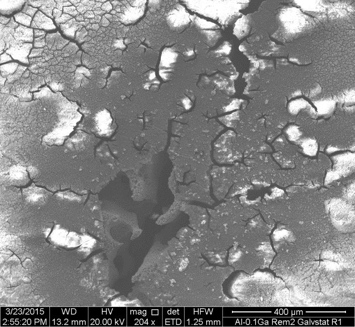 Potential, mv 20 Figure 25: SEM image of 2 nd remelt after galvanostatic testing, showing cracked-mud appearance, which indicates local attack underneath the oxide layer Figure 26: SEM image of 2 nd