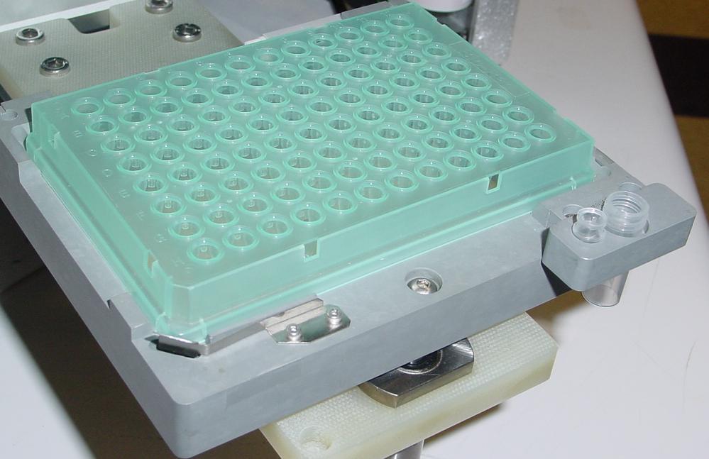 Inserting a Chip into the LabChip GX Instrument 1. Place the sample plate, Ladder Tube and Buffer Tube onto the plate holder of the LabChip GX. 2.