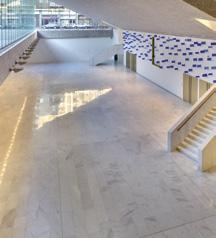 4 - Example of installation of white Carrara marble with GRANIRAPID white University Bocconi, Milan Italy ULTRALITE S1 one-component, high-performance, flexible, lightweight, cementitious adhesive