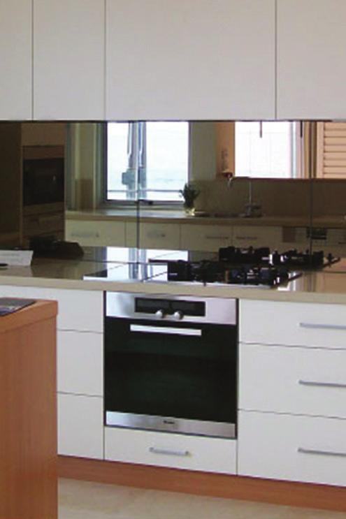 Contemporary kitchen design has resulted in a demand for a mirror-look splashback, however traditional mirror cannot be used as it is not durable and cannot be toughened Australian Standards dictate