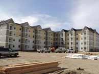 Trailhead Condos at Suncadia Cle Elum, Washington Post-tensioned concrete parking level below grade Three levels of modular construction Double loaded corridor (barbell units) 2-3