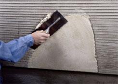 Best Practices for Brown Coat Application Moisten the scratch coat. Wet the wall surface with a gentle stream of water, working from the bottom to the top.
