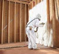 Fiber glass insulation is spun from molten sand and recycled glass into fibers.