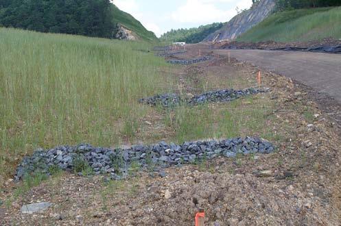 Rock must be placed along ditch bottom first, then up the sides. Rock layer thickness should be 1½ times the average diameter of the largest fourth of the rocks.