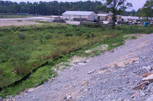 Protecting Stream Channels, Wetlands, and Lakes 63 Use of silt fence to protect small intermittent stream adjacent to construction site.