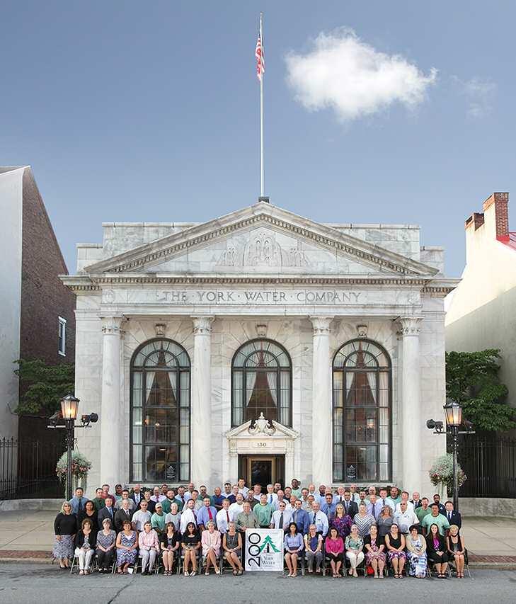 Photo (above): Employees of The York Water Company in front of the Company s Headquarters, built
