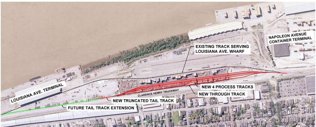 onto the tracks until a longer tail track could be constructed. However, only one track length of cars could be pulled into the yard at a time using the truncated tail track.