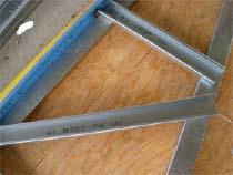 Manufacturing Steel roof trusses are typically assembled on large metal or wood tables. The tables are fitted with pins and clamp fixtures that hold the truss pieces in place.