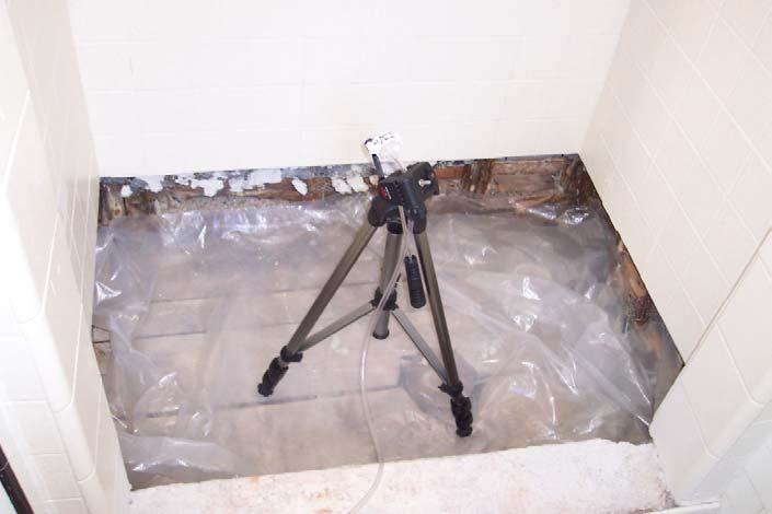 The tile surround in the shower had been removed from the shower floor and bottom foot of shower wall.