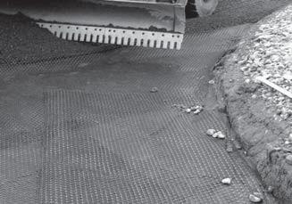 Overlap ( shingle ) geogrids in the direction that the fill will be spread (Image 3) to avoid peeling of geogrid at overlaps by the advancing fill.
