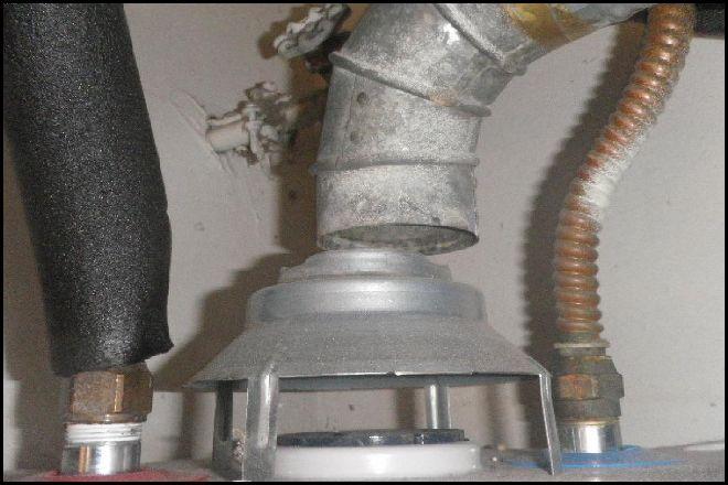 The water heater exhaust vent pipe is not securely fastened or supported, a condition that could hinder or preclude the