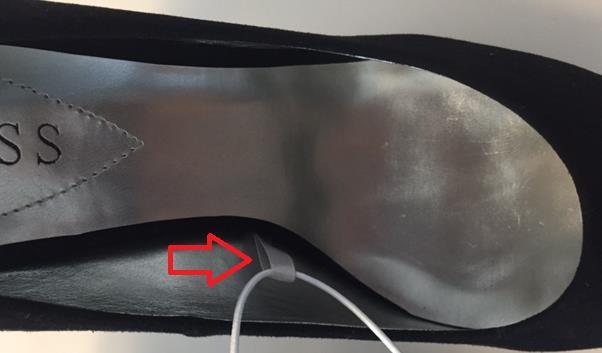 into the insole of both shoes. Soft tab material must match shoe lining.