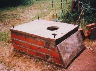 concrete toilet slab is then fitted and bonded on top of the vault in cement mortar (Figure 6-6).