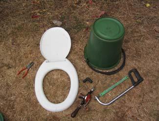 bend and through the plastic pipe. The urine outlet pipe is added to the polyethylene pipe bend (Figure 6-27).