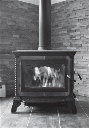 Q13. A wood burning stove is used to heat a room. Photograph supplied by istockphoto/thinkstock The fire in the stove uses wood as a fuel.