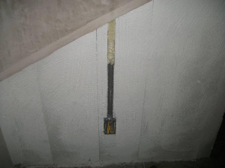 Retrofit electrical after house is completed PlasterMax Mesh Cut flush ----- Foam not yet cut ----- Note the conduit and box is