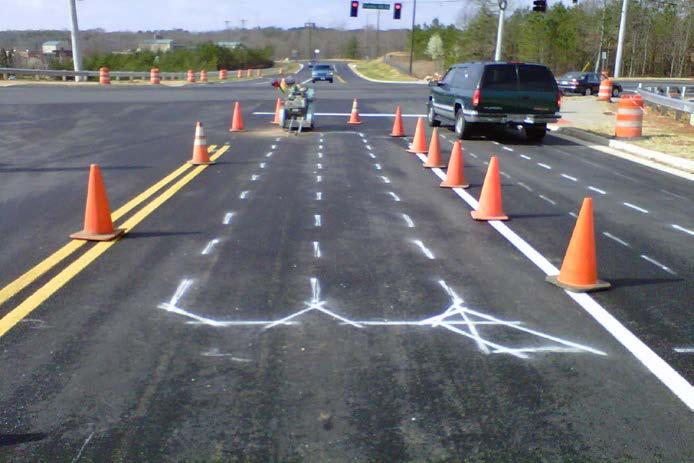 Section H. Loops 1. All loops are to be marked on the asphalt by temporary means. Temporary means can be temporary marking paint or chalk or other temporary means. Example D.Below 2.