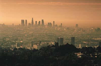 Using Resources Wisely Smog Smog is a gray-brown haze formed by chemical reactions among pollutants released into the air by industrial processes and automobile