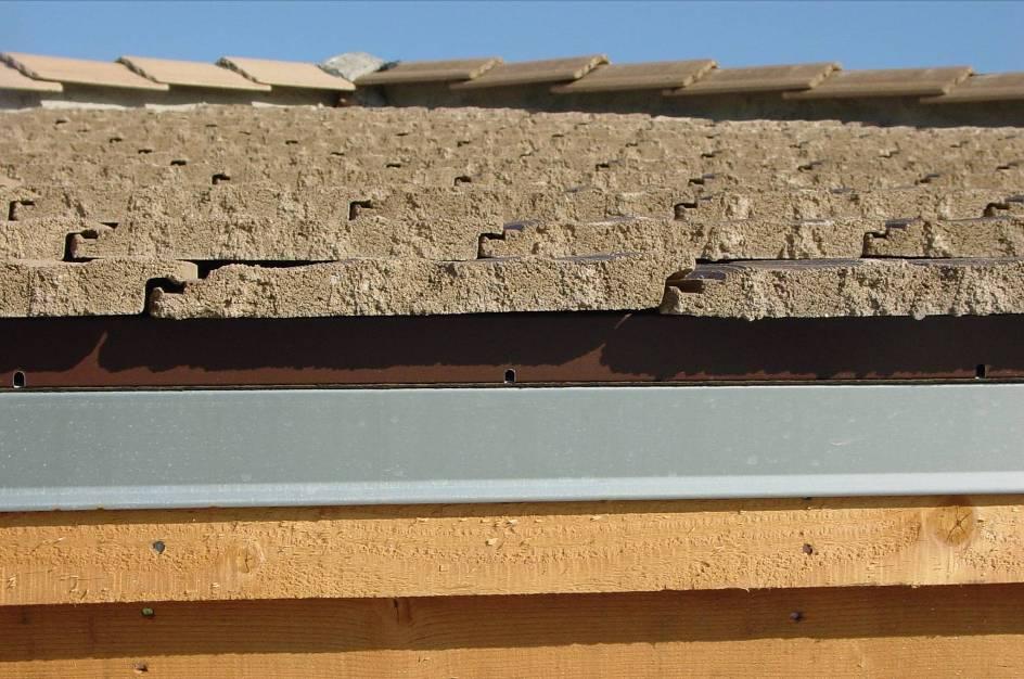 Metal eave riser and closure strips with weep holes for drainage and other possibilities for